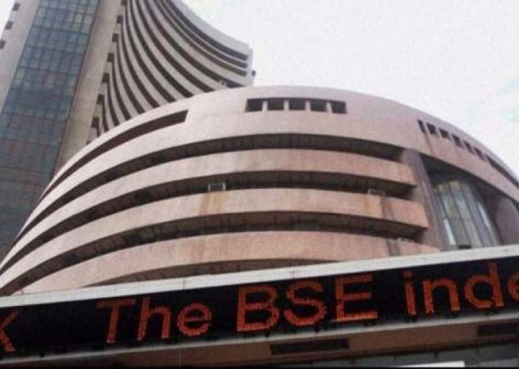 Equity indices trade in red, healthcare stocks tumble