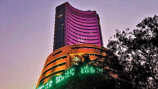 Sensex gains over 100 points; Nifty near 9900