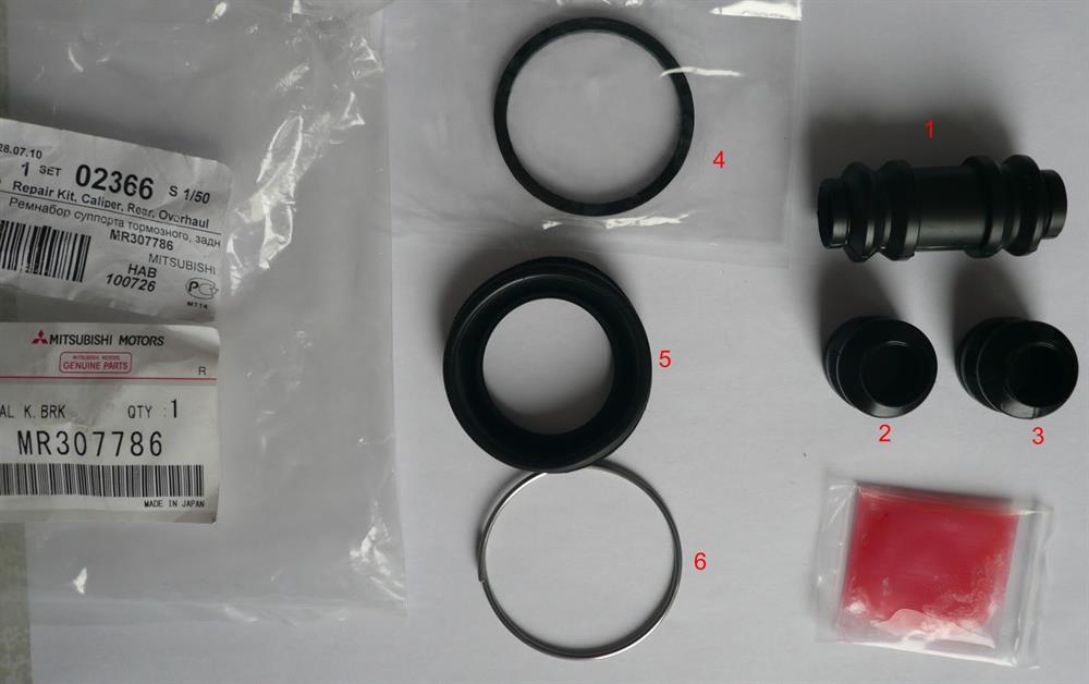 MMR307786 Mitsubishi kit de reparação de suporte do freio traseiro