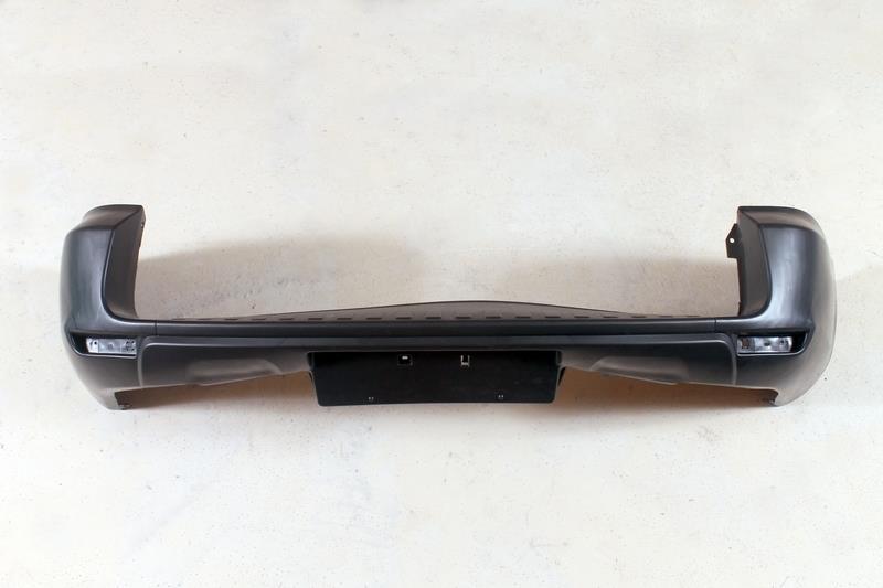 Бампер задний Toyota 5215042907