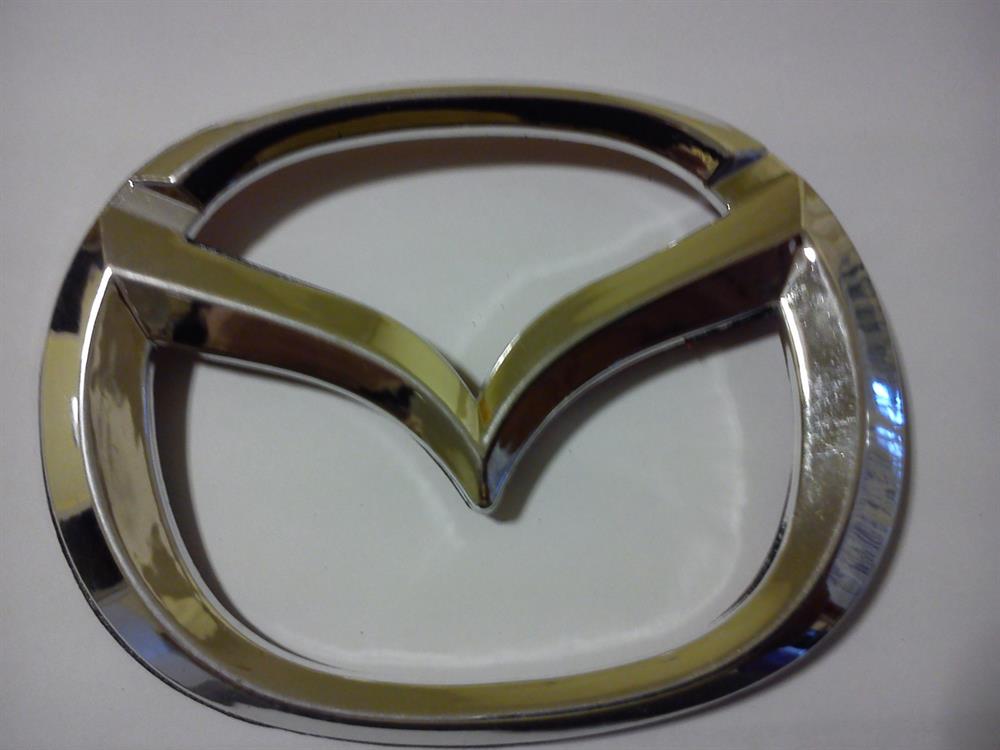 Эмблема решетки радиатора на Mazda CX-7 Sport 