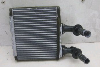 Радиатор печки (отопителя) на Nissan Primera P11