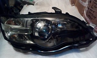 Правая фара 84001AG301 Subaru
