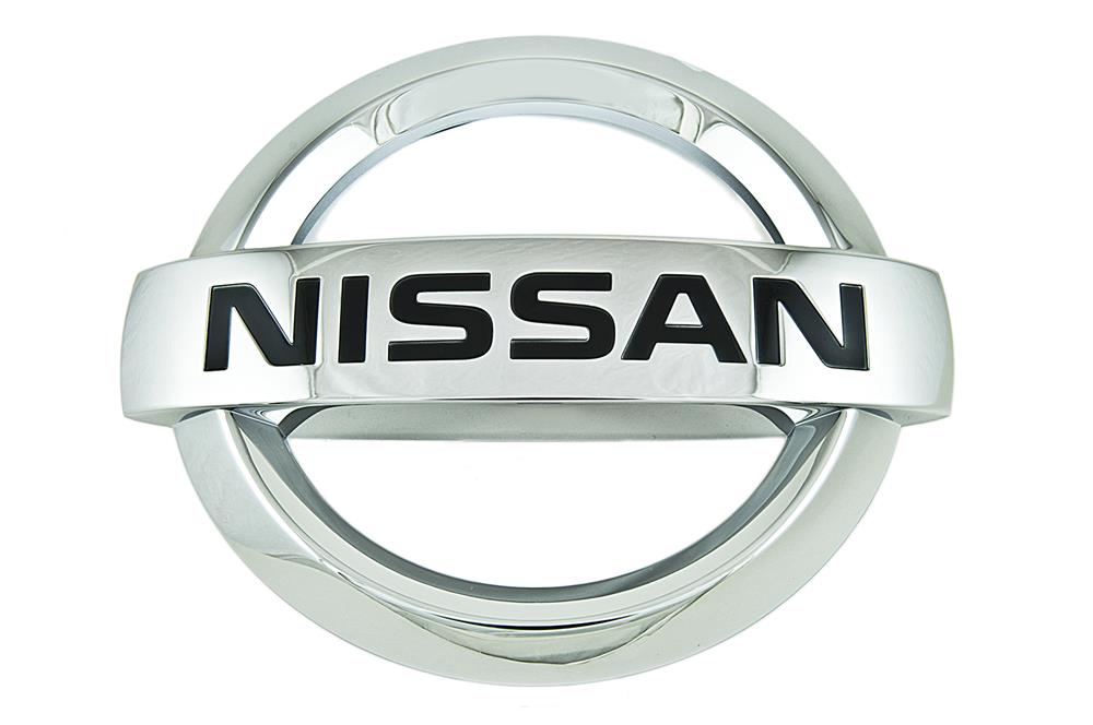 Эмблема решетки радиатора на Nissan X-Trail T31