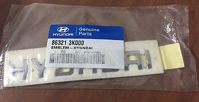863213K000 Hyundai/Kia emblema de tampa de porta-malas (emblema de firma)