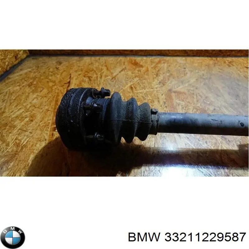 33211229587 BMW Полуось задняя левая