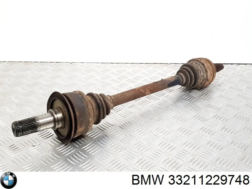 Купить 33211229748 BMW Полуось задняя левая