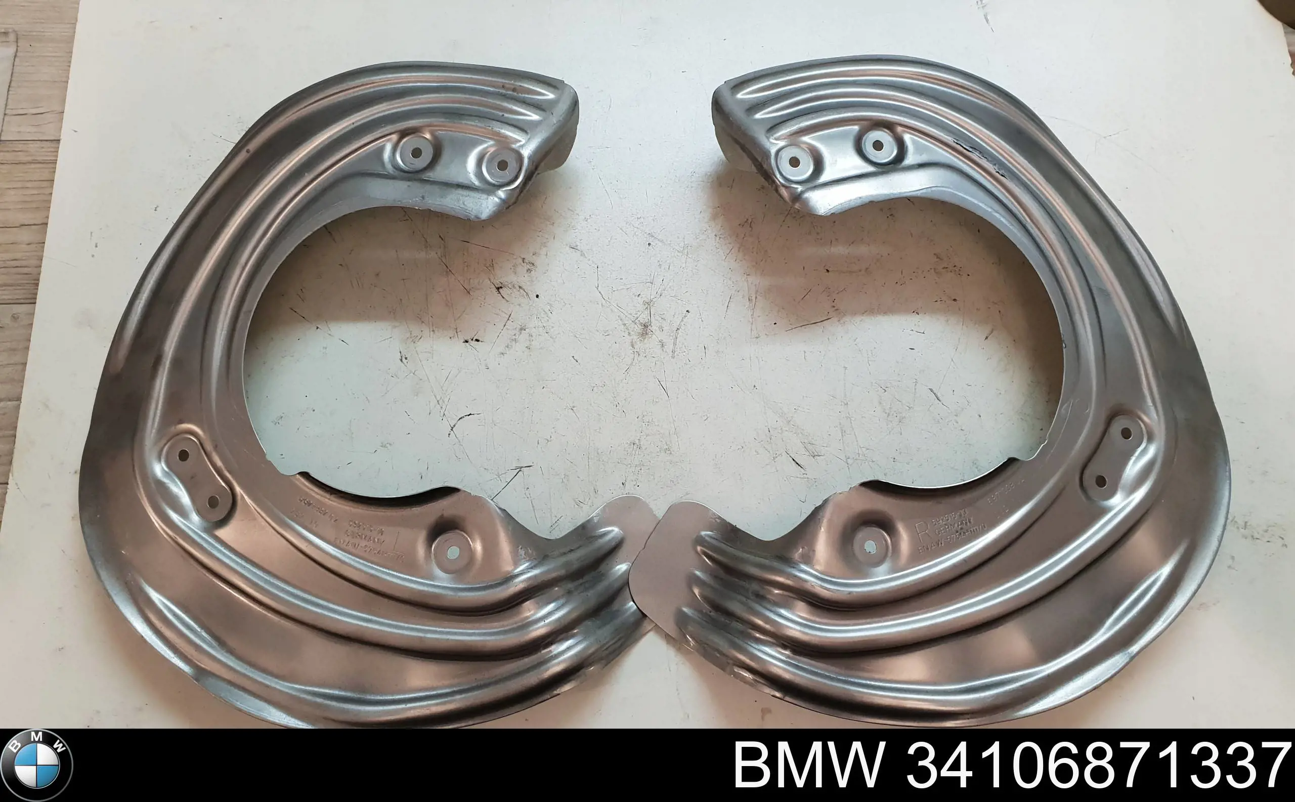 Щиток тормозного диска переднего левого BMW 34106871337 цена, от 63.40 USD