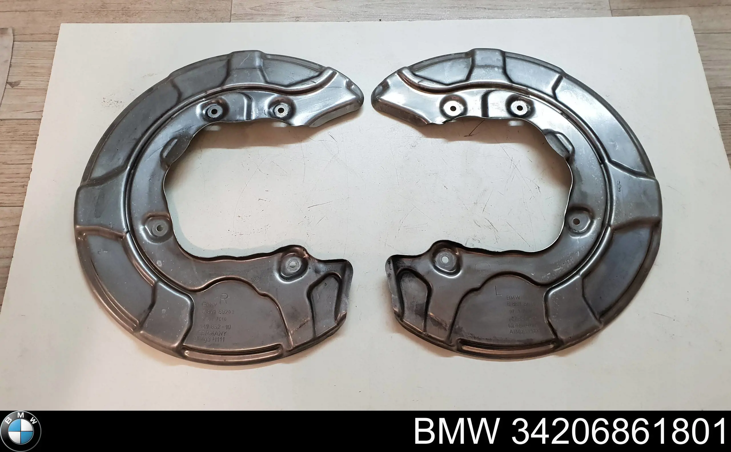 Щиток тормозного диска заднего левый BMW 6861801 цена, от 12.65 USD