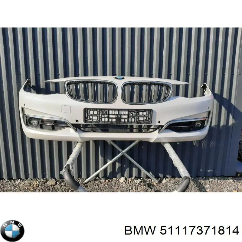Передний бампер 51117371814 BMW