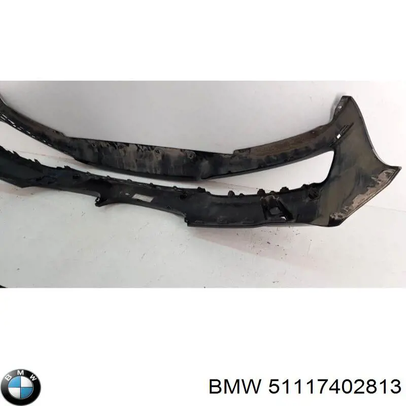 Передний бампер 51117402813 BMW