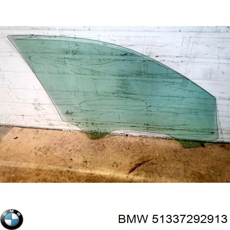 Стекло двери передней левой 51337292913 BMW