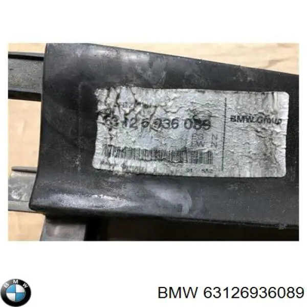 63126936089 BMW consola (adaptador de fixação da luz dianteira esquerda)