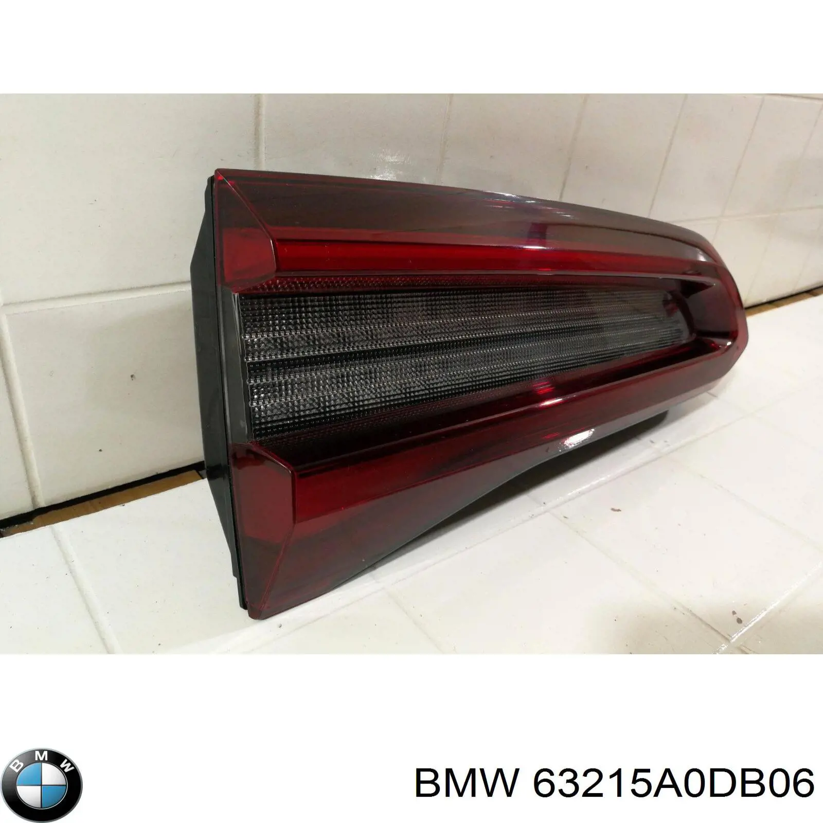 Фонарь задний правый внутренний 63215A0DB06 BMW