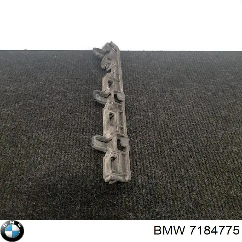 Кронштейн наружной накладки порога левой 7184775 BMW