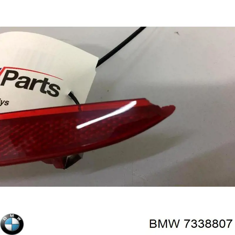 Левый отражатель заднего бампера 7338807 BMW
