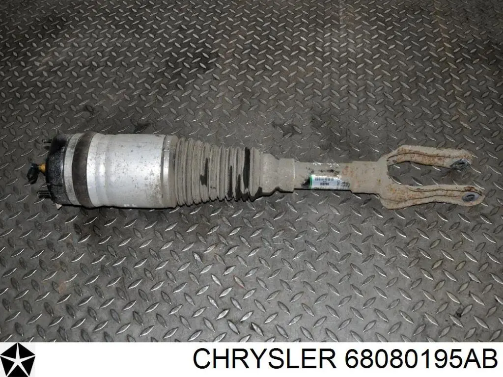 Купить 68029903AF Chrysler Амортизатор подвески передний левый
