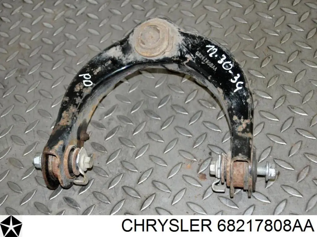 Рычаг передней подвески верхний правый Chrysler 68217808AA цена, от 29.56 USD