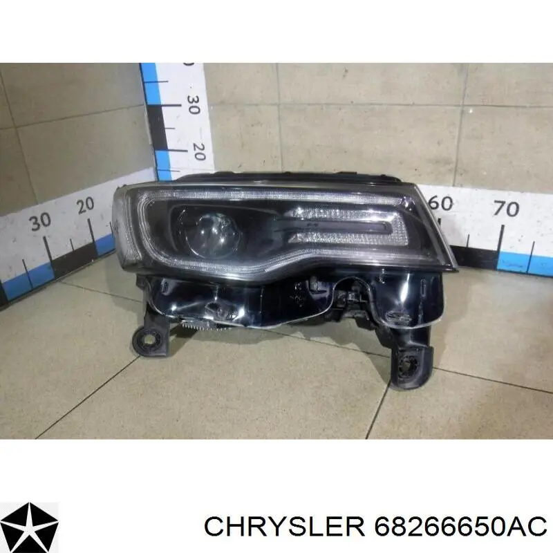 Купить 68266650AJ Chrysler Фара основная правая