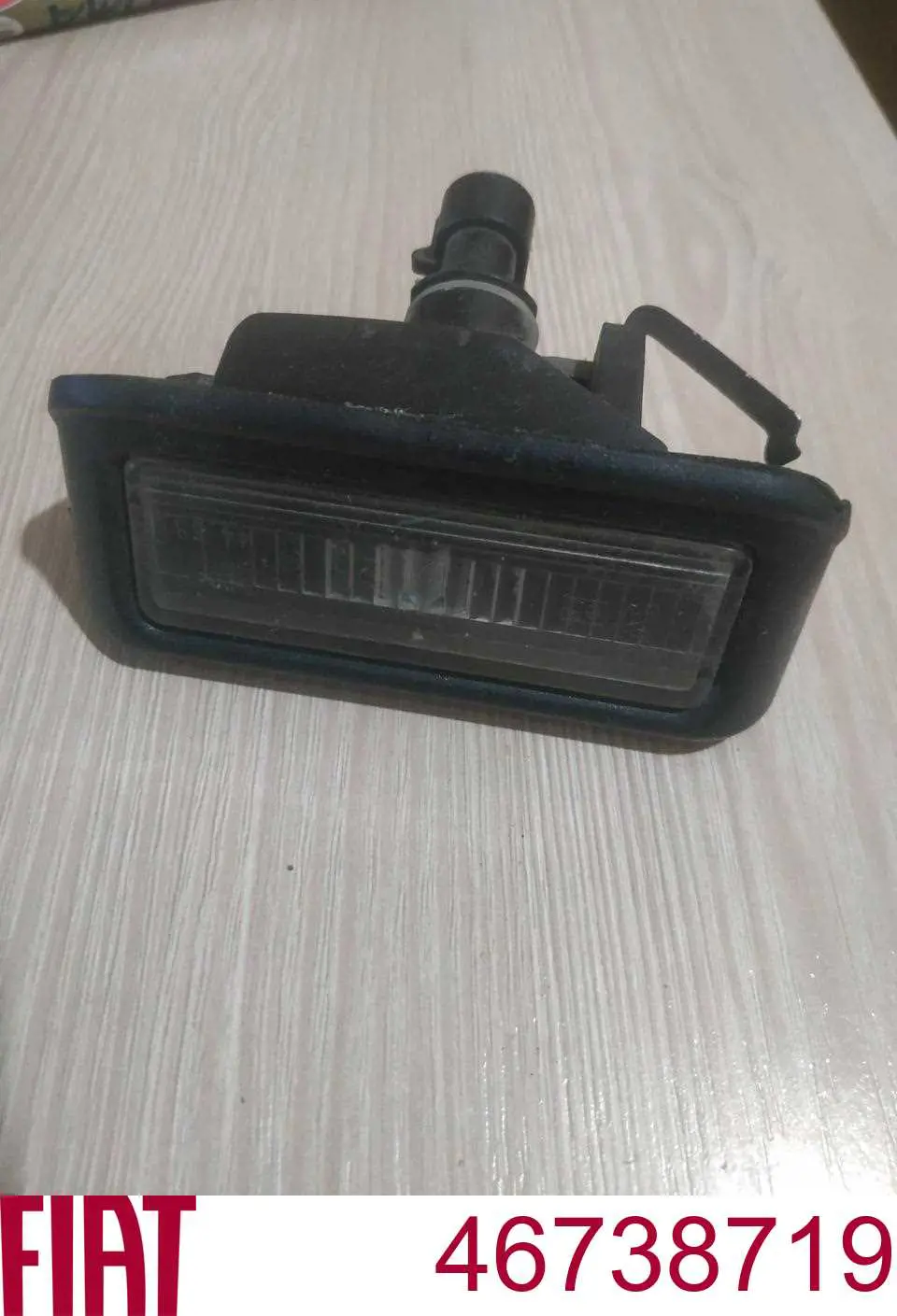  Фонарь подсветки номерного знака Fiat Doblo 1