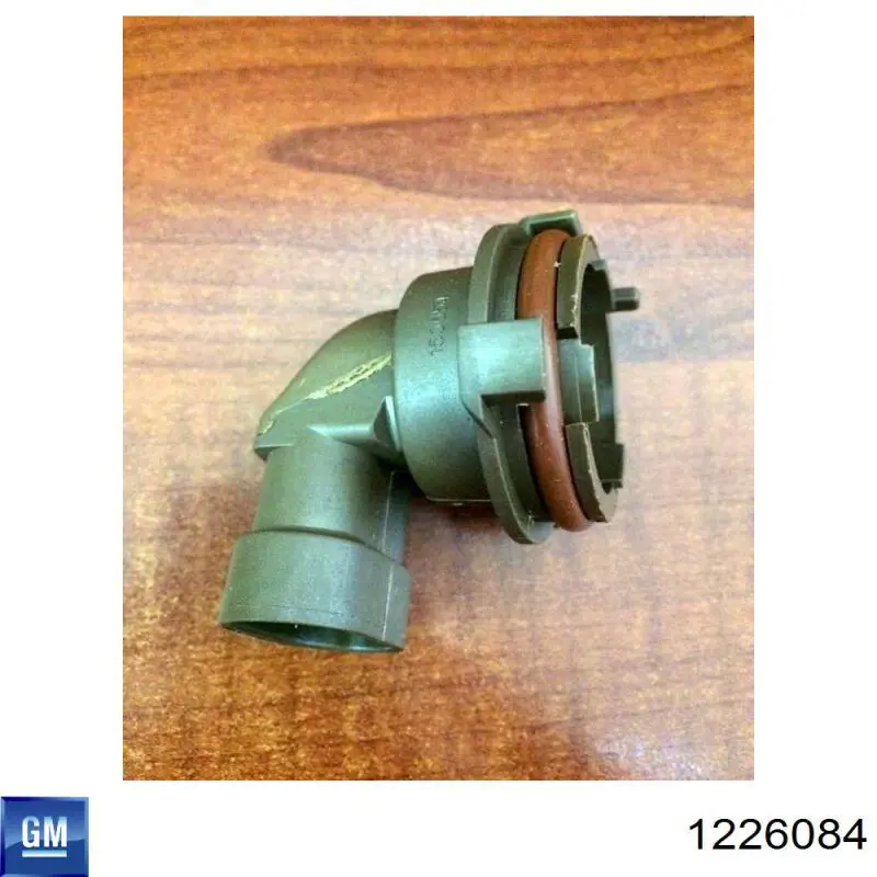 Цоколь (патрон) лампочки фары 1226084 General Motors