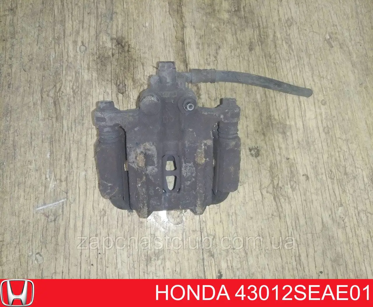 43012SEAE01 Honda суппорт тормозной задний правый
