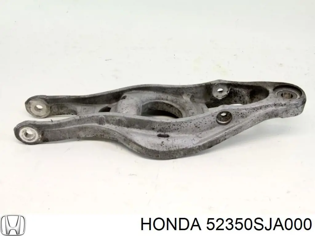 Купить 52350SJA000 Honda Нижний рычаг задней подвески