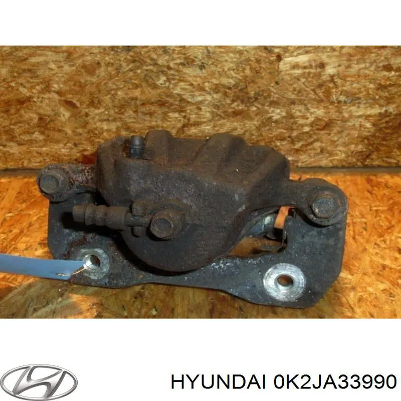 Купить 0K2JA33990 Hyundai/Kia Суппорт тормозной передний левый