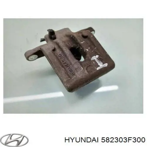582303F300 Hyundai/Kia Суппорт тормозной задний правый