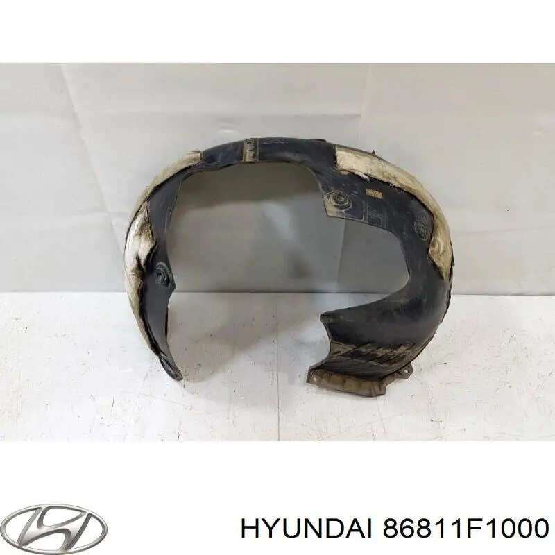 86811F1000 Hyundai/Kia guarda-barras esquerdo do pára-lama dianteiro