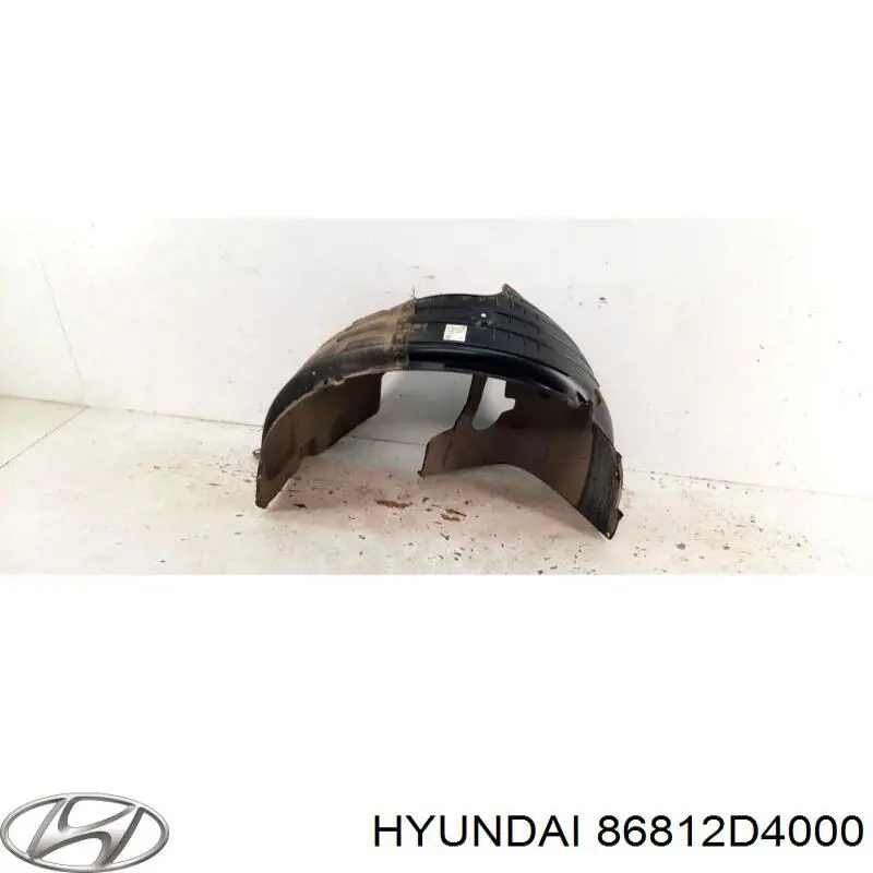 86812D4000 Hyundai/Kia guarda-barras direito do pára-lama dianteiro