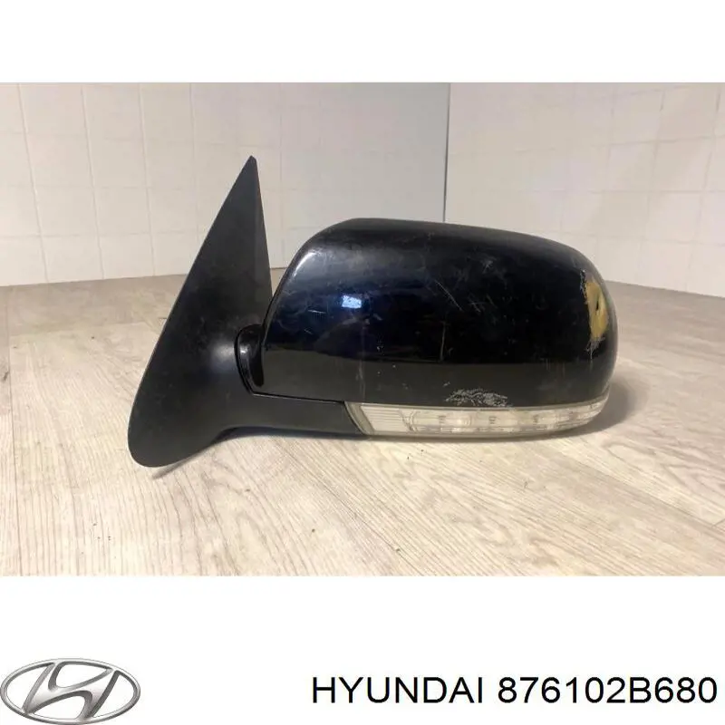Зеркало заднего вида левое Hyundai/Kia 876102B680