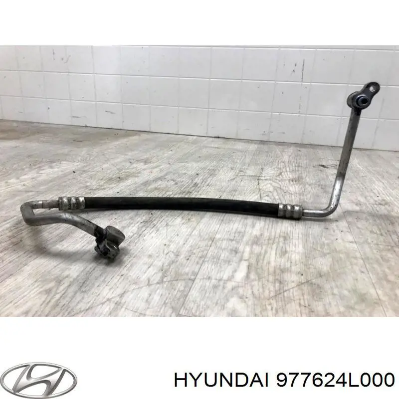 Купить 977624L000 Hyundai/Kia Шланг кондиционера, от компрессора к радиатору
