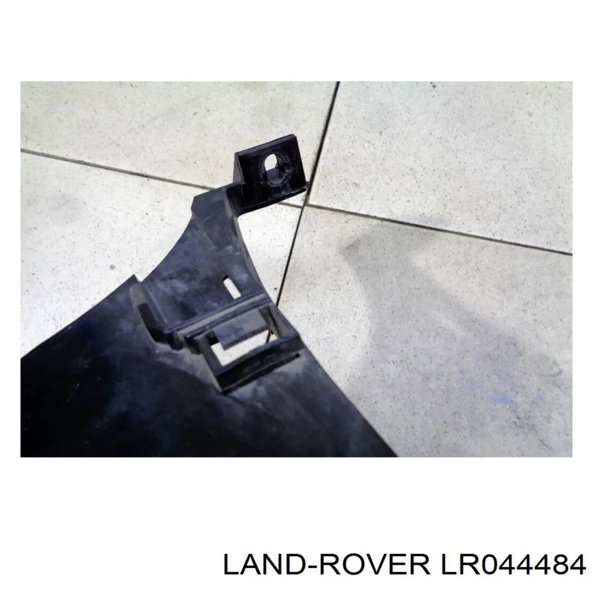 LR044484 Land Rover Крепление фары передней, левой