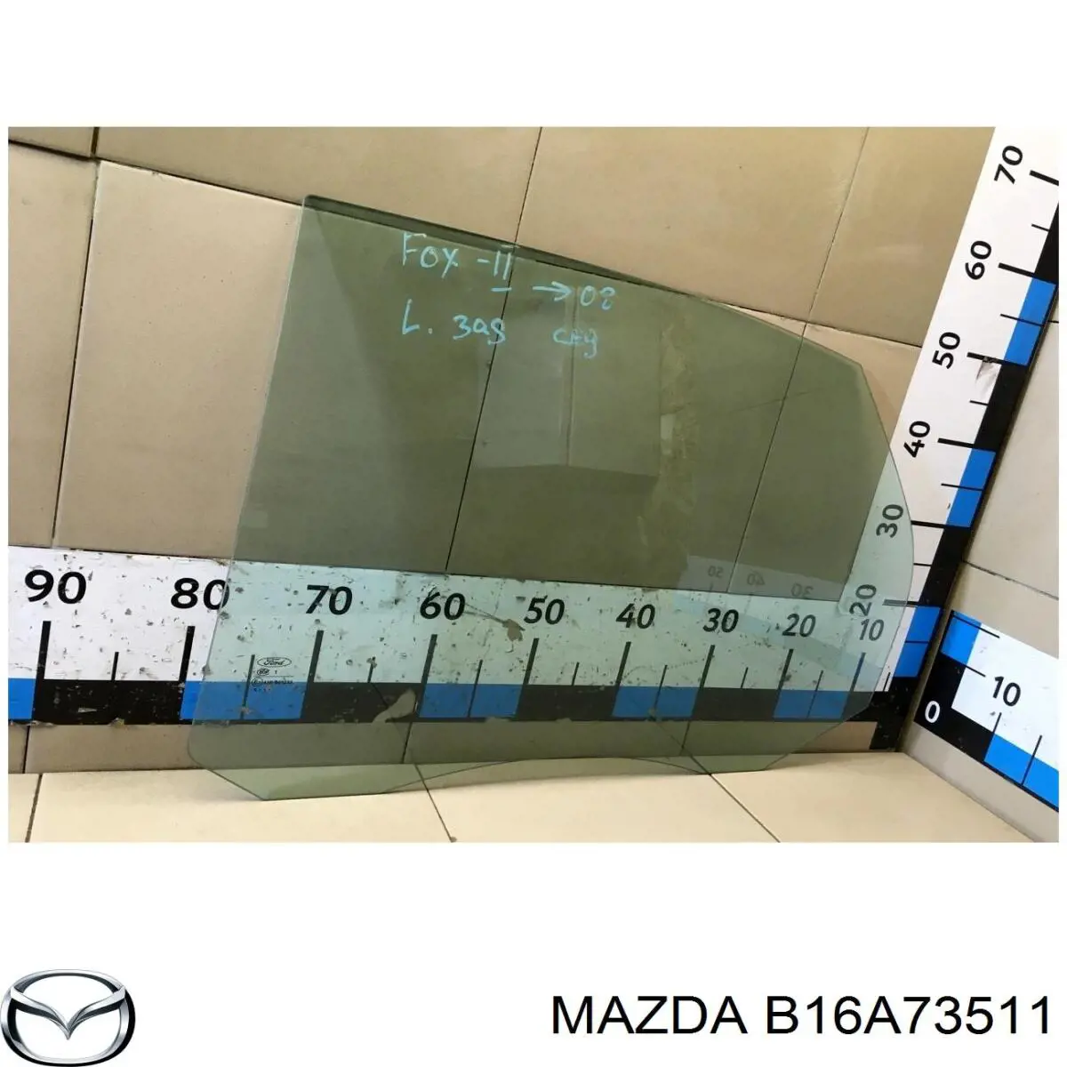Стекло двери задней левой B16A73511 Mazda