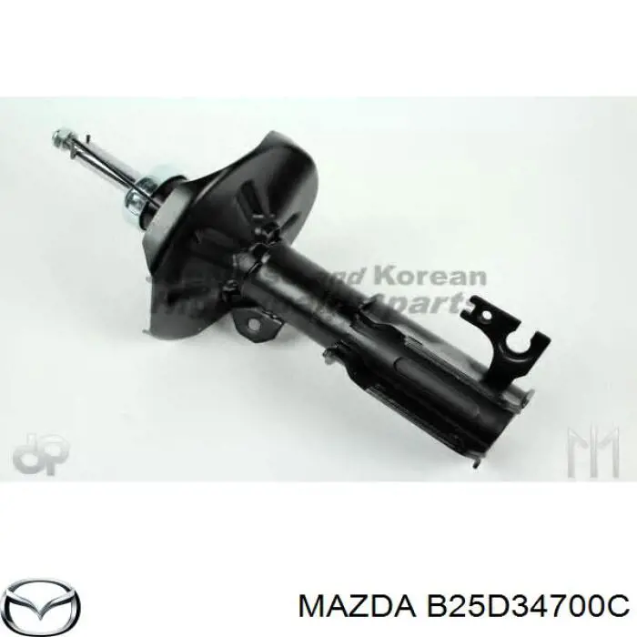 Амортизатор передний правый B25D34700C Mazda