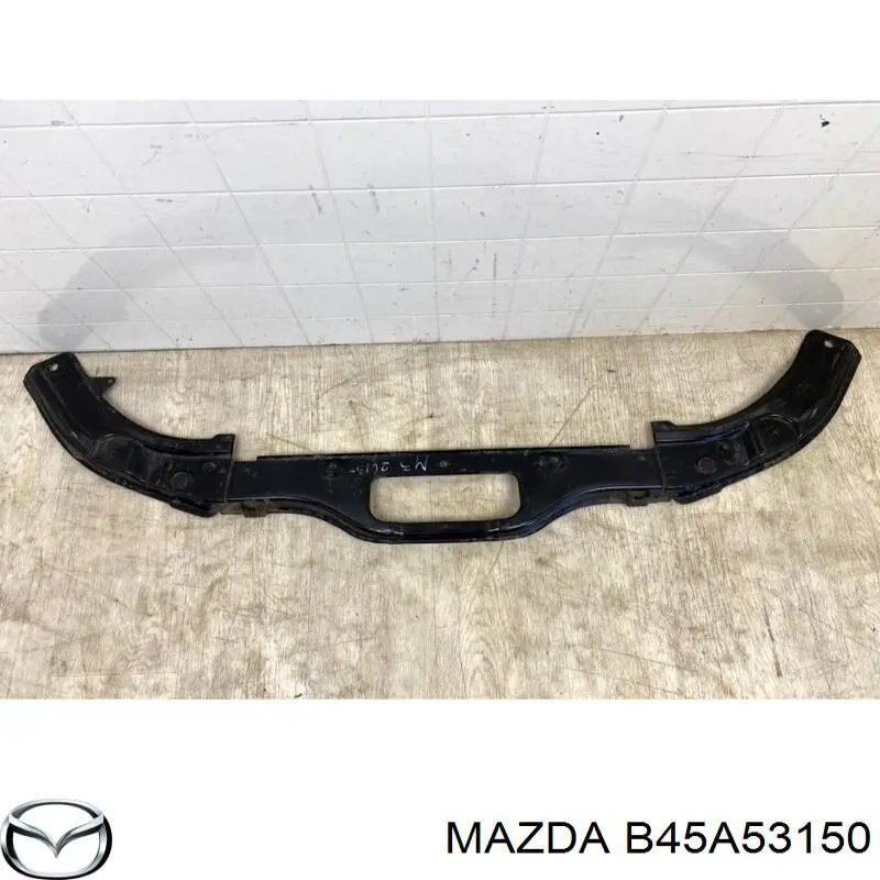 Суппорт радиатора верхний (монтажная панель крепления фар) Mazda B45A53150