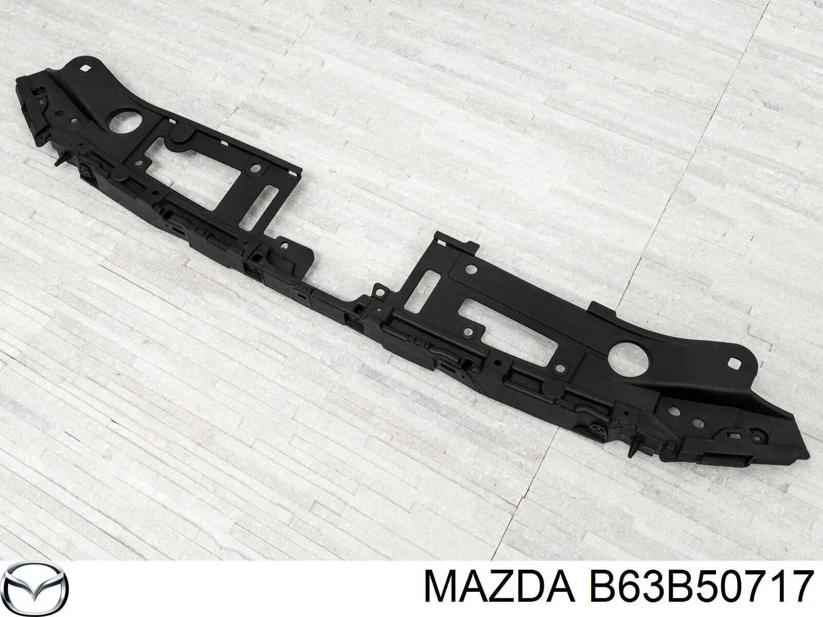 Кронштейн решетки радиатора Mazda B63B50717 цена, от 31.04 USD