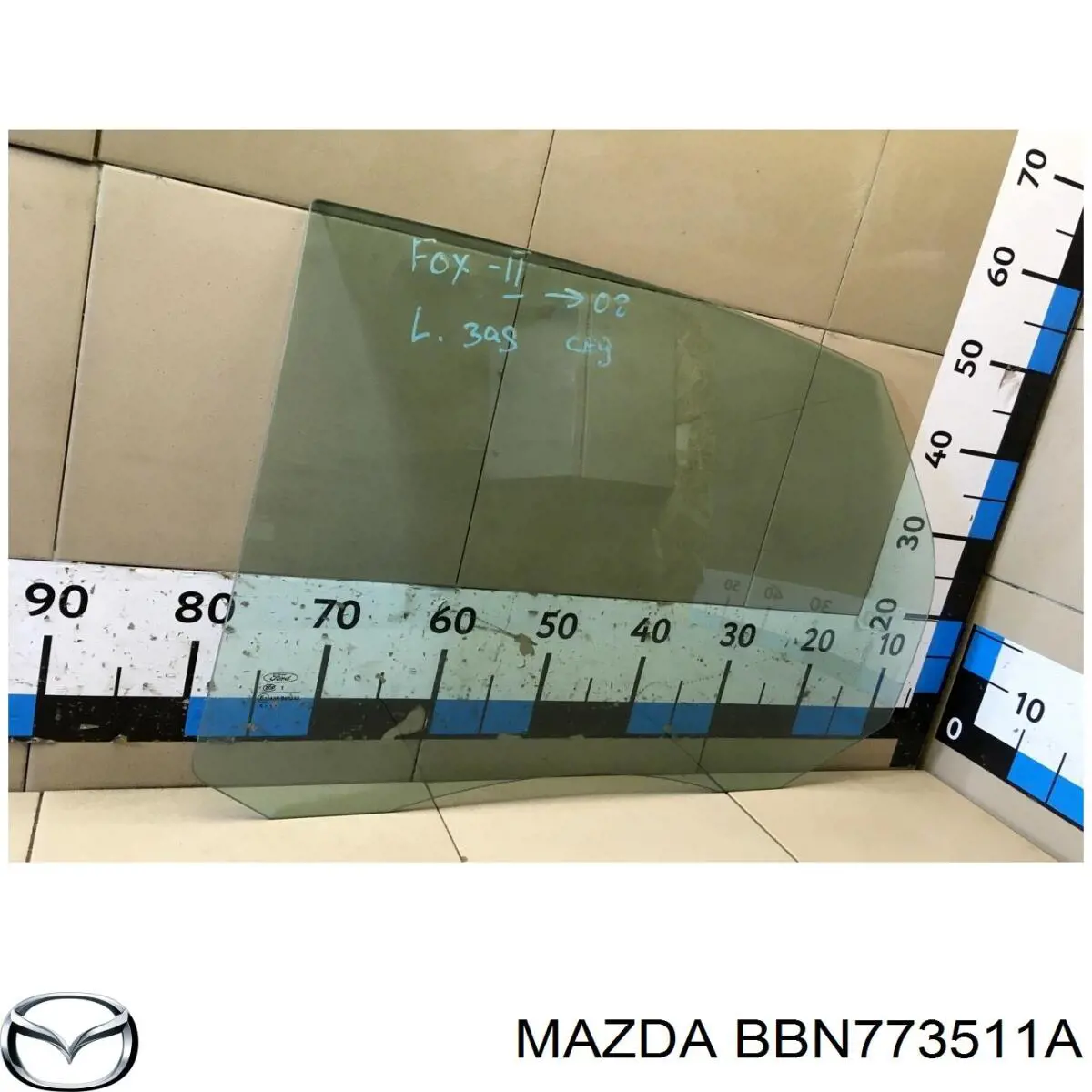 Стекло двери задней левой BBN773511A Mazda