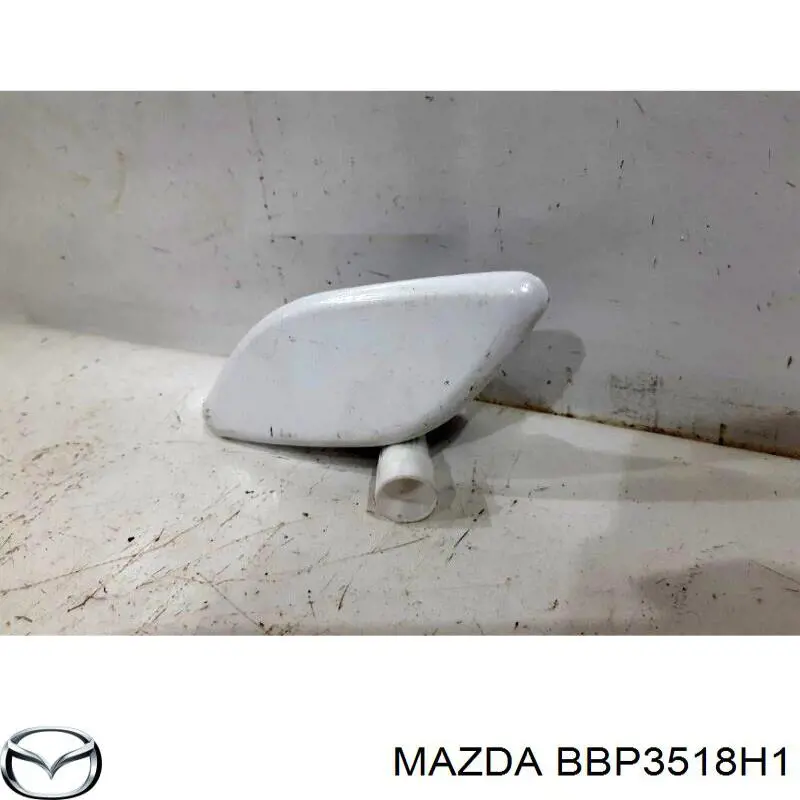 Накладка форсунки омывателя фары передней на Mazda 3 BL