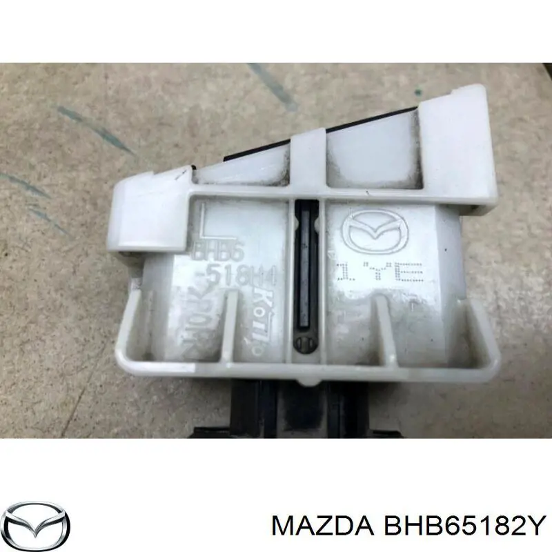BHB65182Y Mazda Держатель форсунки омывателя фары, подъемный цилиндр