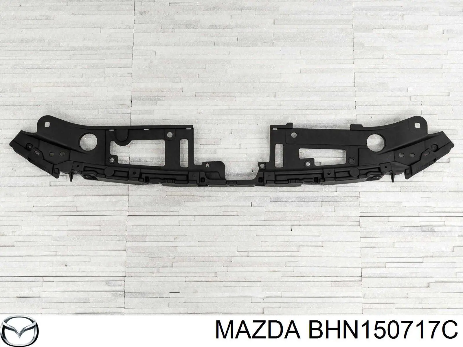 BJS750717A Mazda кронштейн решетки радиатора