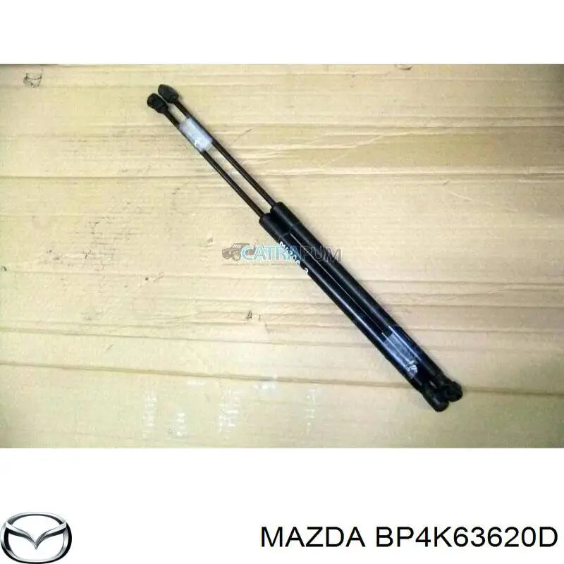 BP4K63620C Mazda amortecedor de tampa de porta-malas (de 3ª/5ª porta traseira)