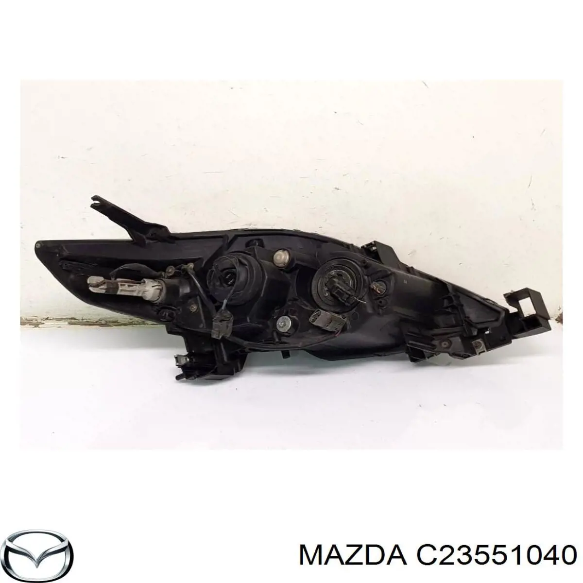 Купить C23551040 Mazda Фара левая передняя