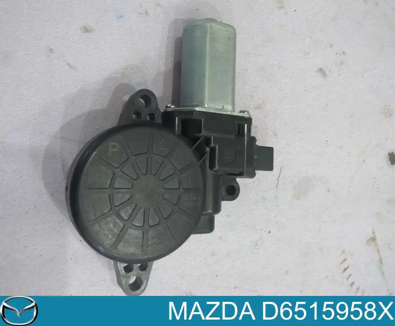 Мотор стеклоподъемника двери передней левой D6515958X Mazda