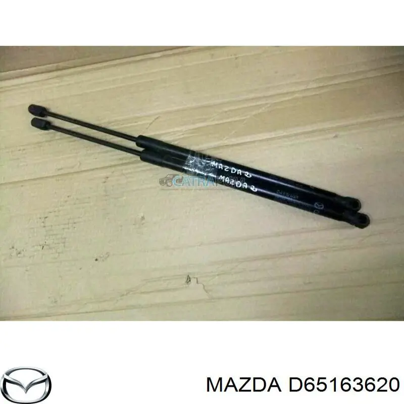 Амортизатор багажника D65163620A Mazda