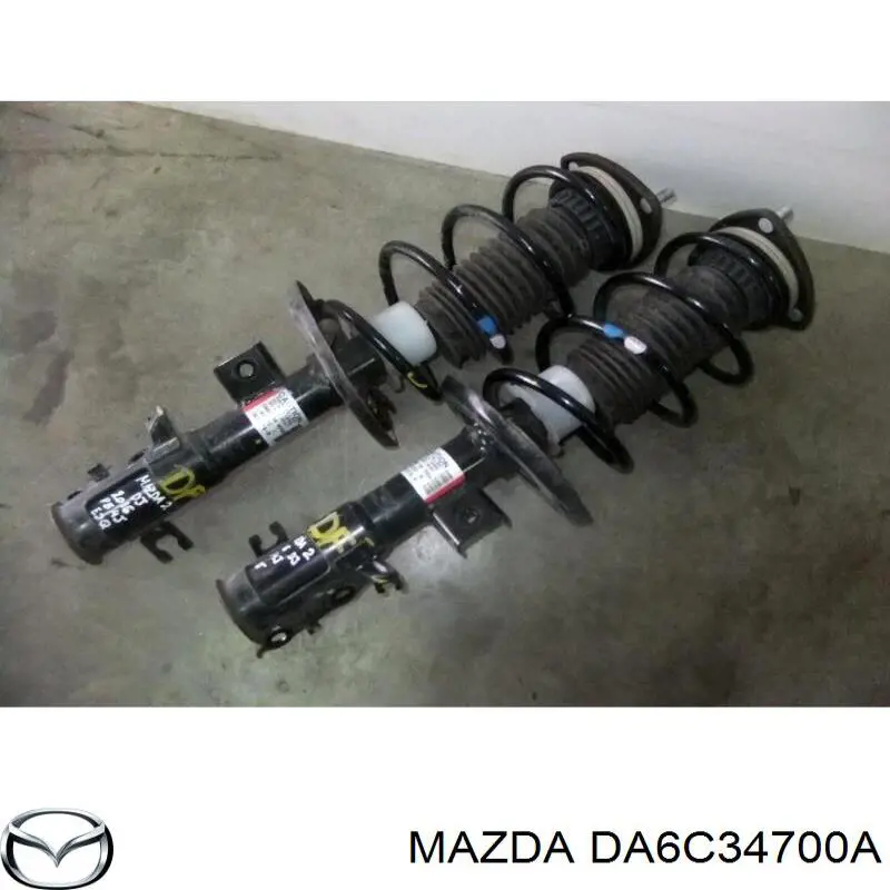 DA6C34700A Mazda Амортизатор передней подвески правый