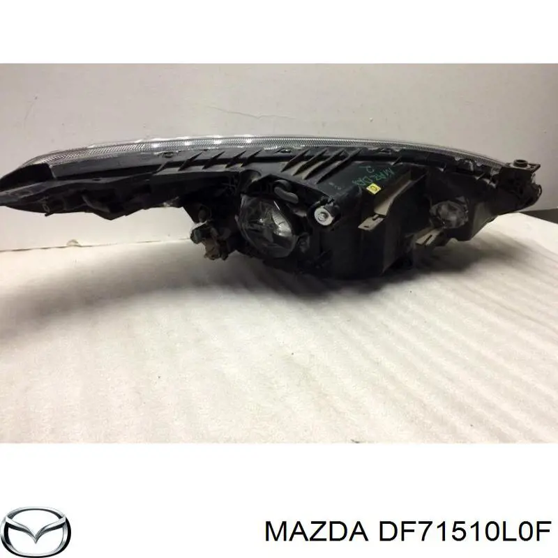 DF71510L0F Mazda фара левая