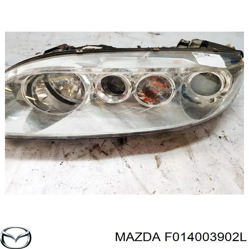 F014003902L Mazda фара левая