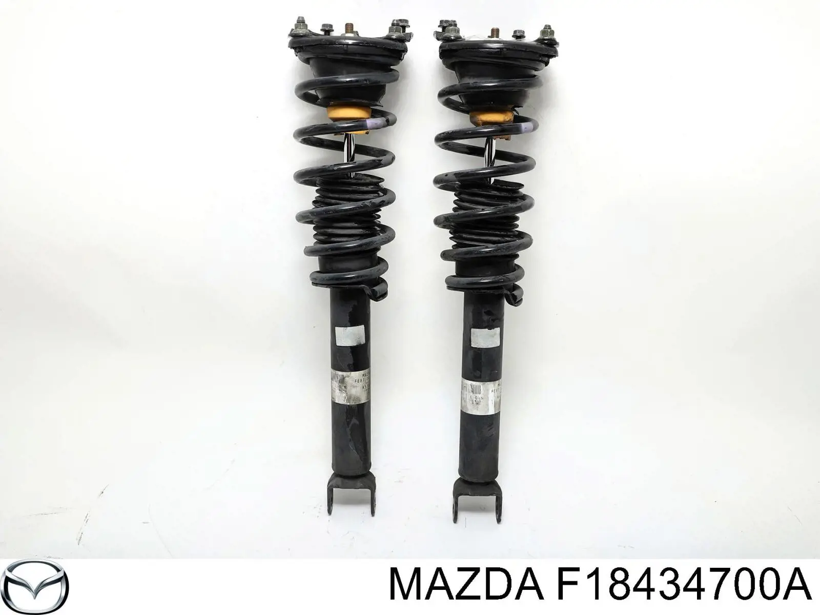 Амортизатор передний Mazda F18434700A